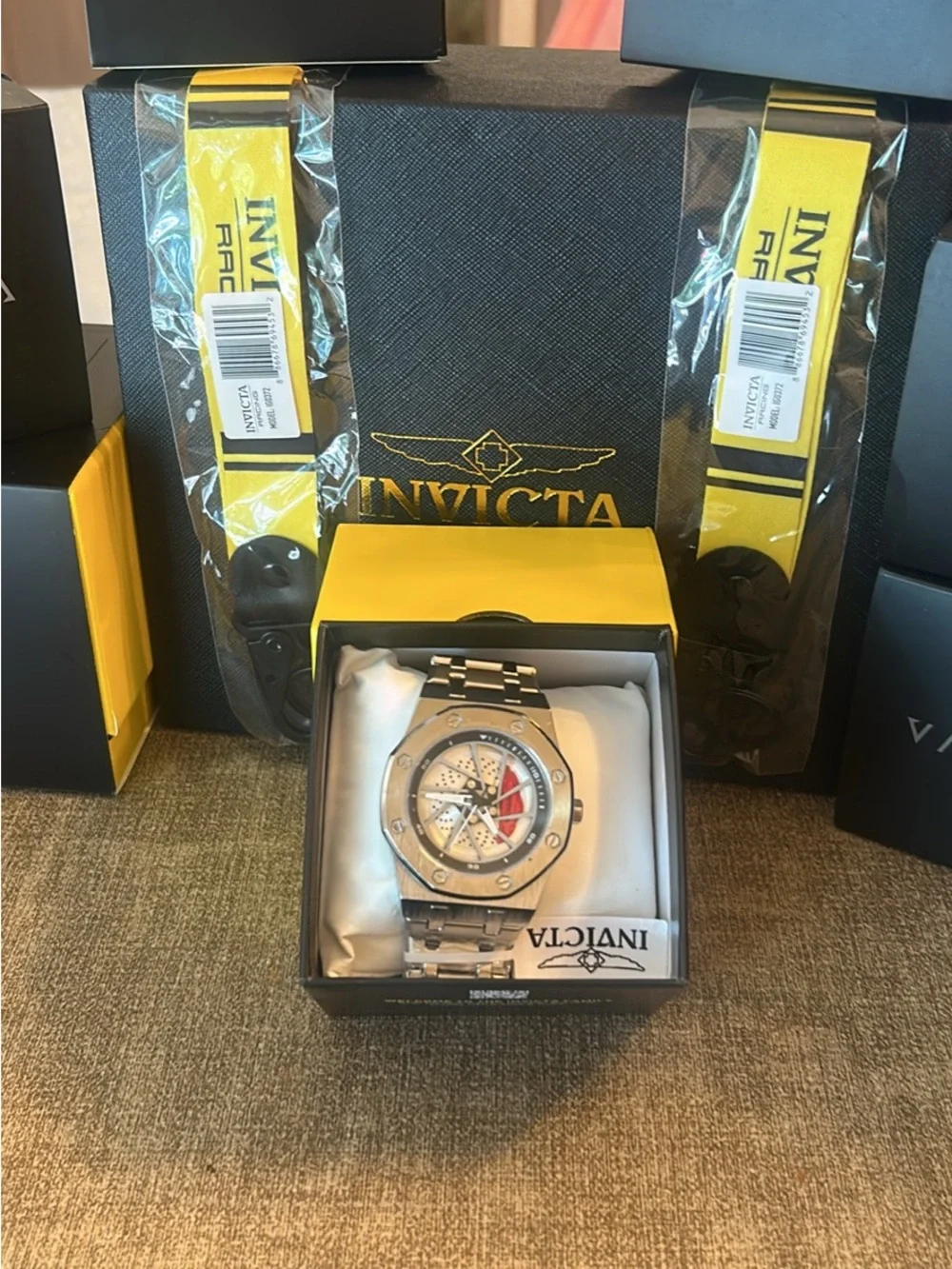 Invicta Men's Silver Watch with Red Accent Skeleton Dial
